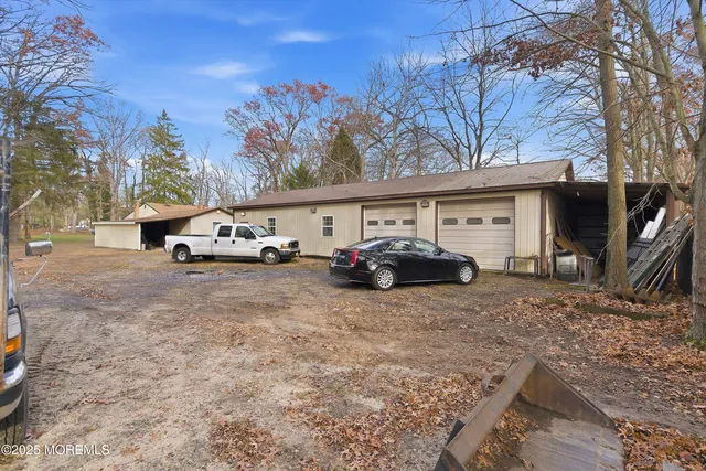 a aerial view of a house with a yard