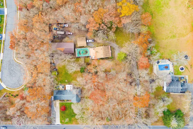 view of backyard with a table and chairs