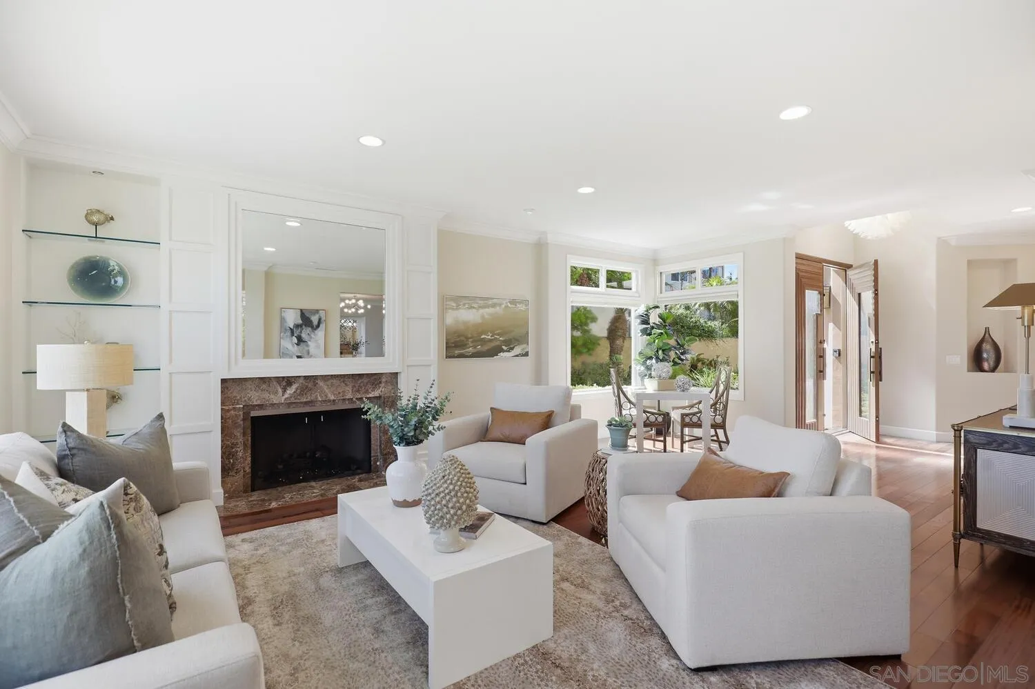 21 Spinnaker Way Coronado, CA 92118 - Photo 11 of 47 a living room with furniture and a fireplace