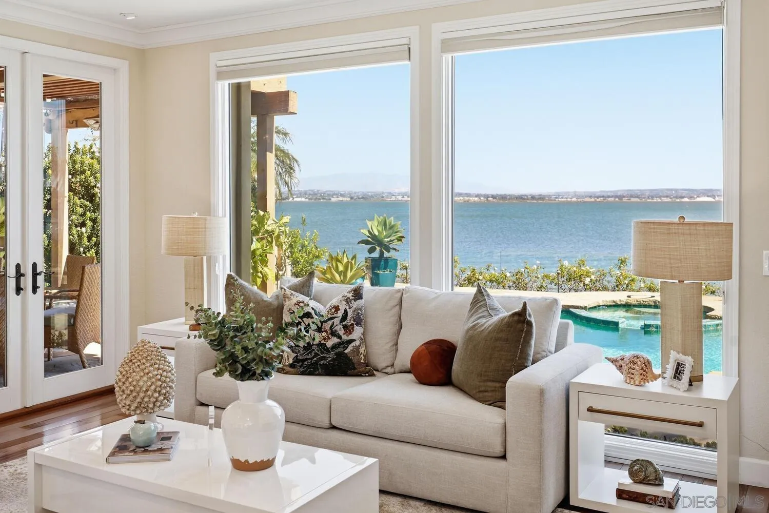 21 Spinnaker Way Coronado, CA 92118 - Photo 12 of 47 a living room with furniture and a large window