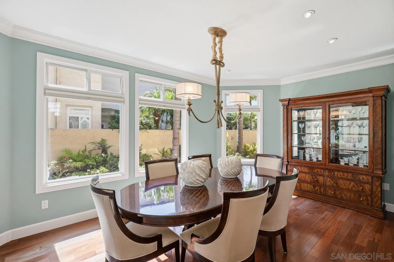 21 Spinnaker Way Coronado, CA 92118 - Photo 20 of 47 a view of a dining room with furniture window and wooden floor