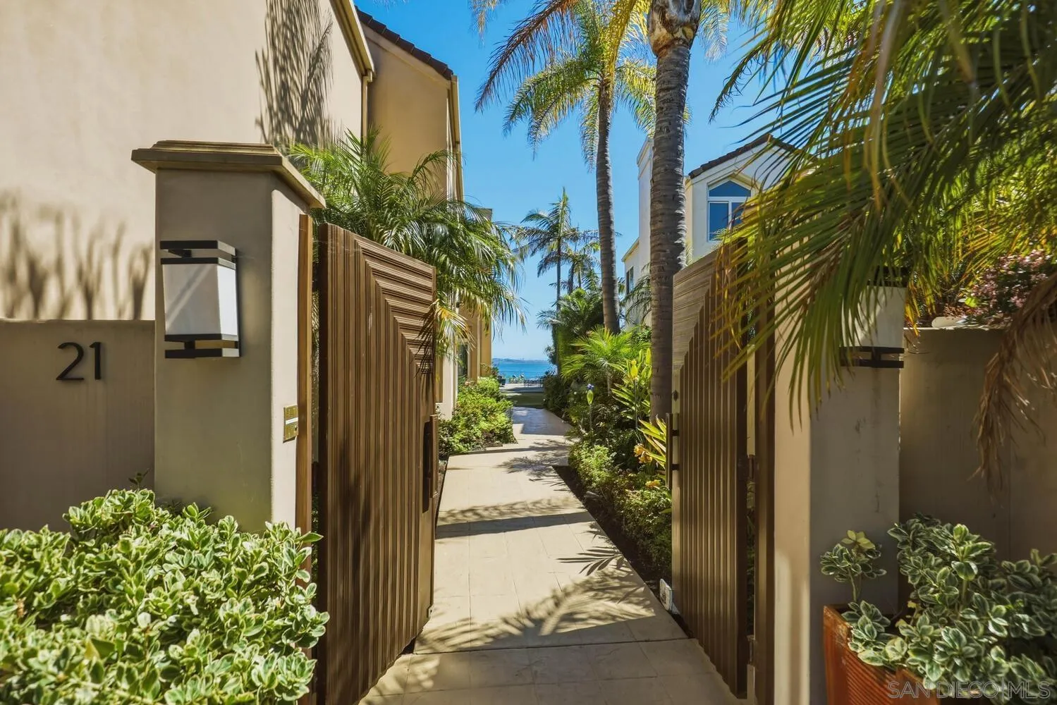 21 Spinnaker Way Coronado, CA 92118 - Photo 3 of 47 a view of a house with a yard