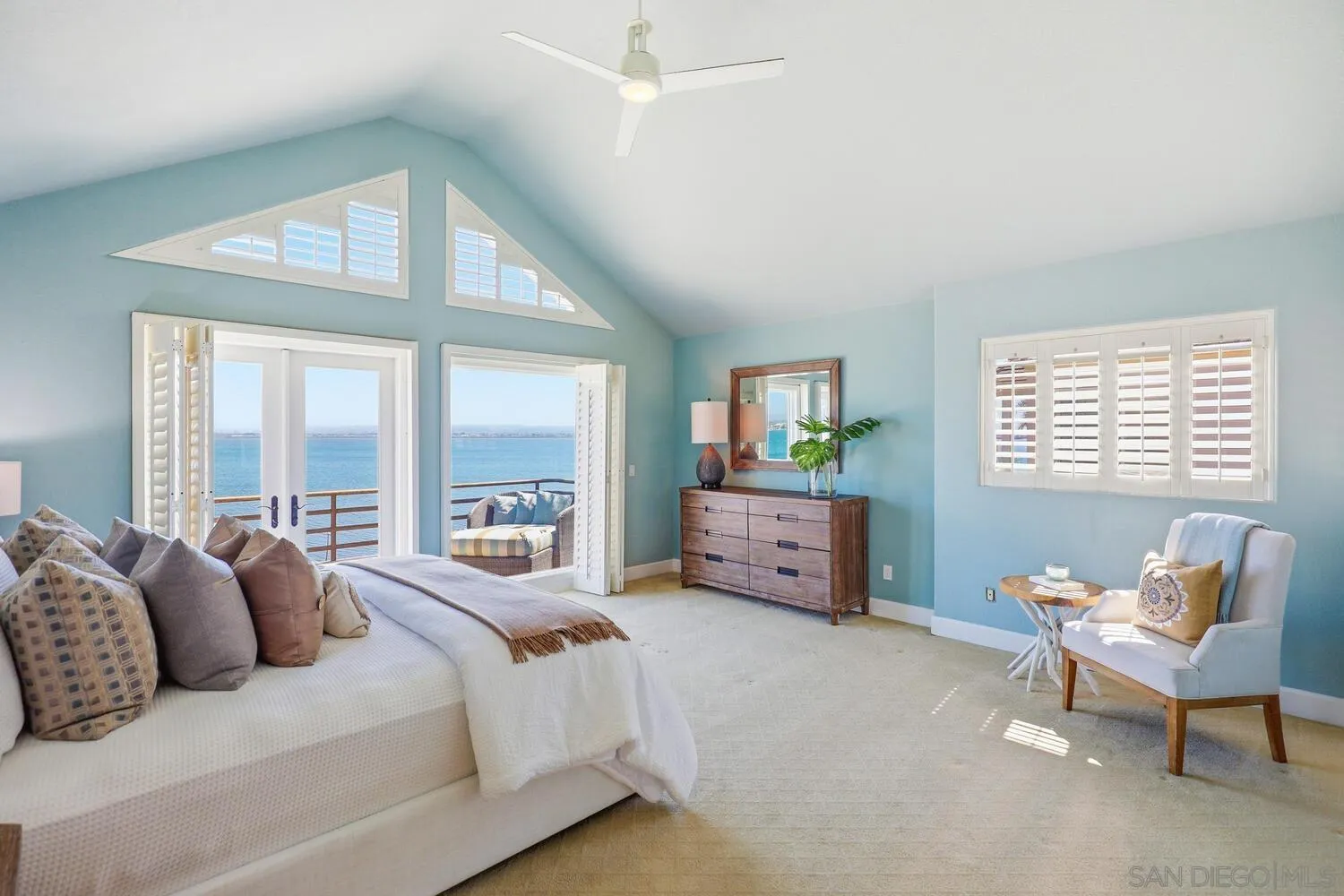 21 Spinnaker Way Coronado, CA 92118 - Photo 34 of 47 a bedroom with furniture and windows