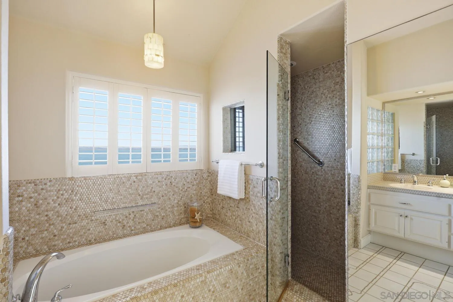 21 Spinnaker Way Coronado, CA 92118 - Photo 39 of 47 a bathroom with a bathtub and a sink