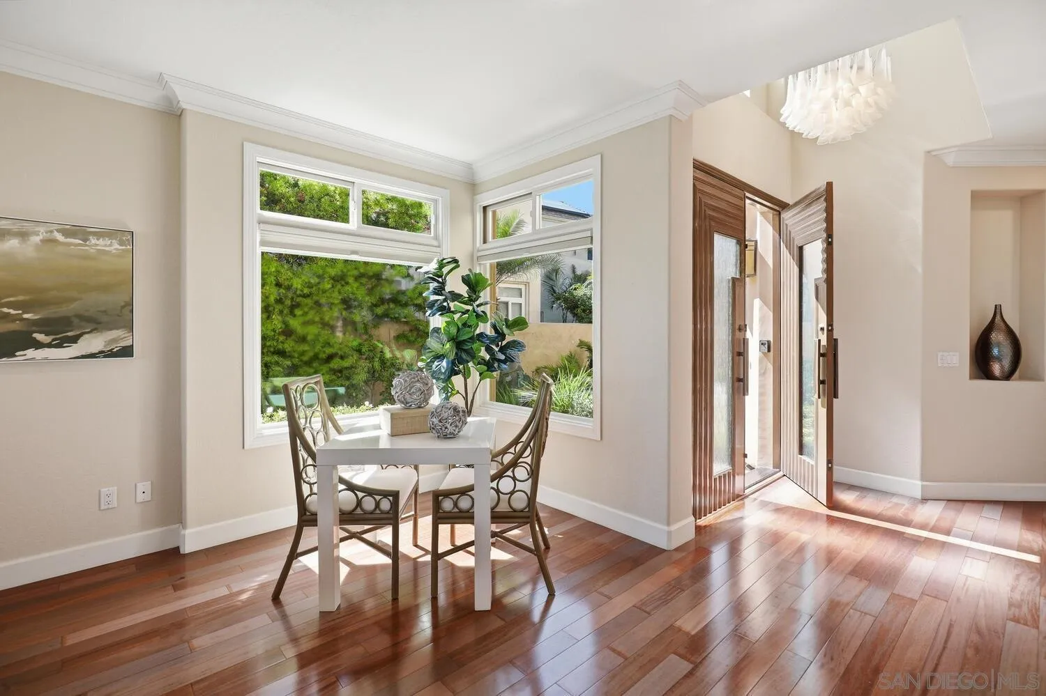 21 Spinnaker Way Coronado, CA 92118 - Photo 10 of 47 a view of a dining room with furniture and a window