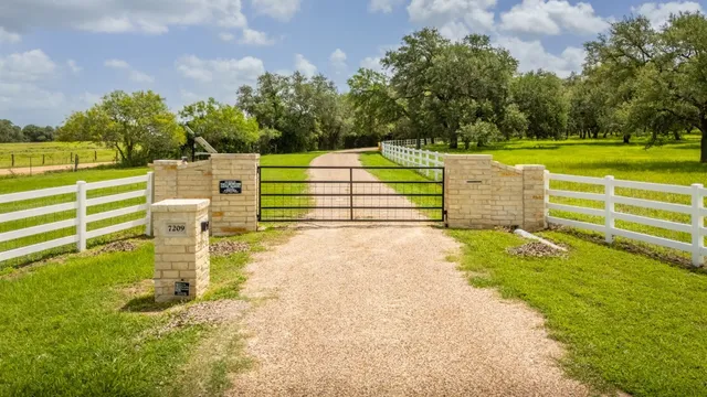 a view of a park with houses