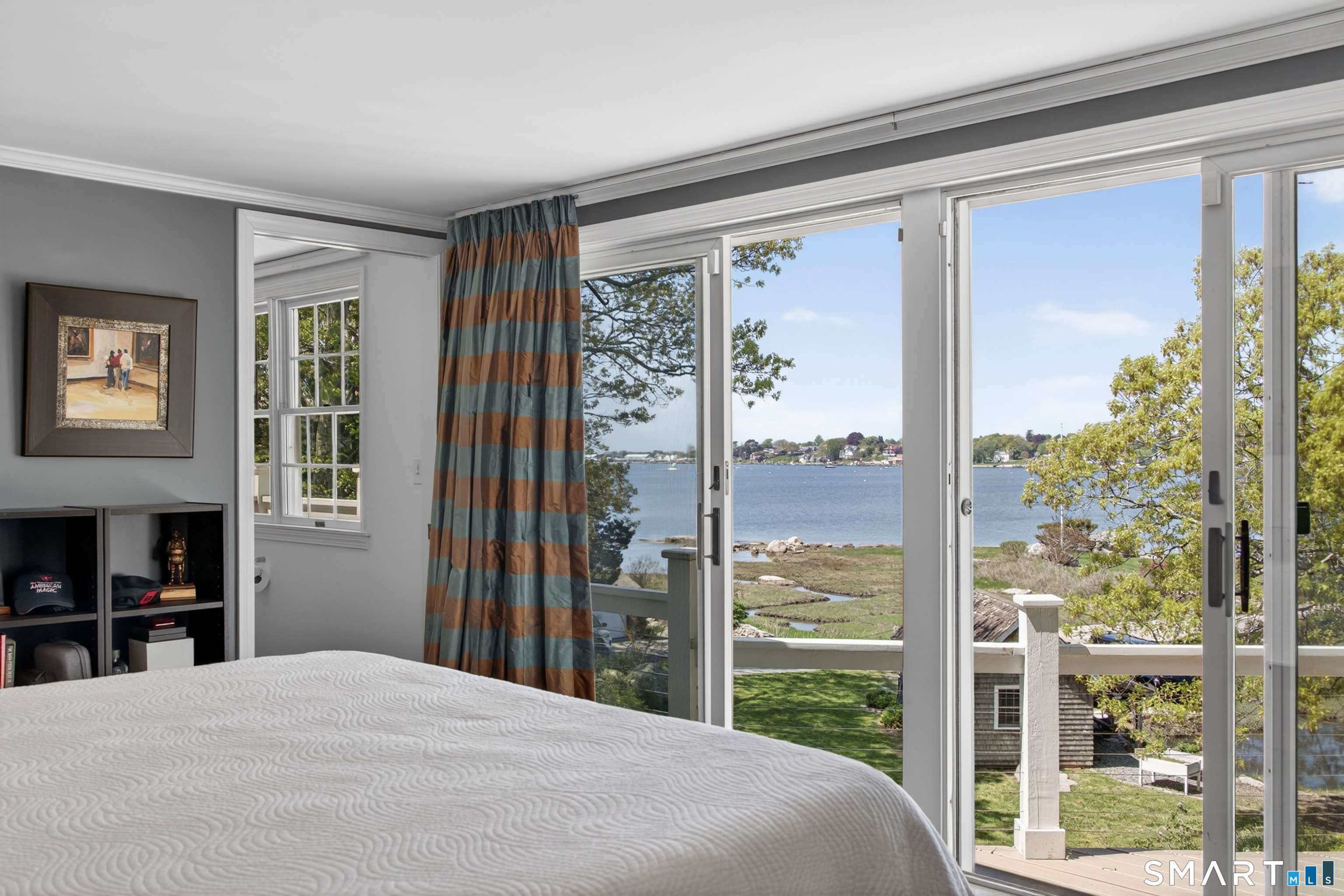 32 Money Point Road Stonington, CT 06355 - Photo 19 of 40 a bedroom with a bed and a large window