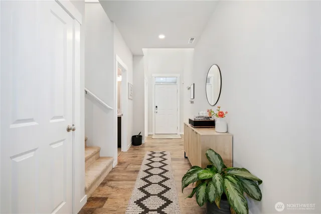 a view of a hallway with entryway