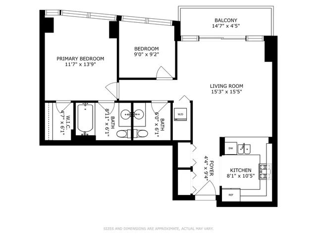 a view of a hallway with wooden floor and a bathroom