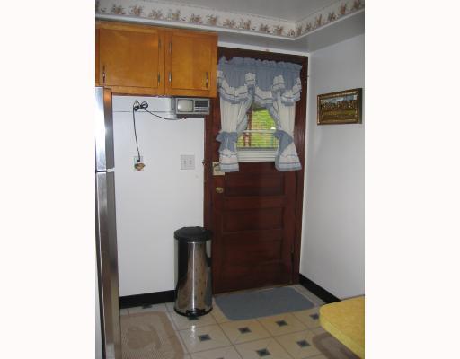 1121 Schang Road Pittsburgh, PA 15236 - Photo 7 of 11 Kitchen. Level exit from kitchen to back yard
