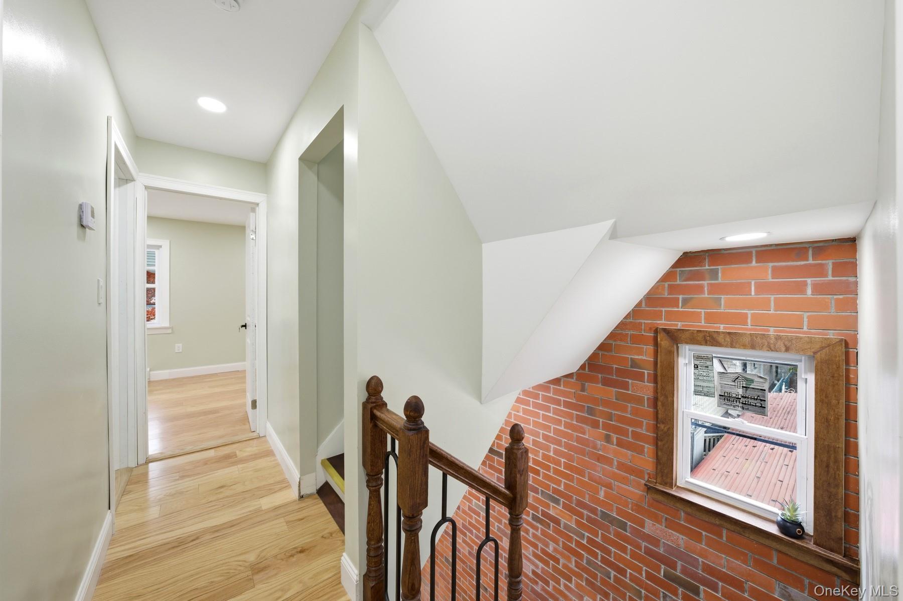 104-11 205th Street Queens, NY 11412 - Photo 20 of 50 Corridor with an upstairs landing, light wood finished floors, and recessed lighting