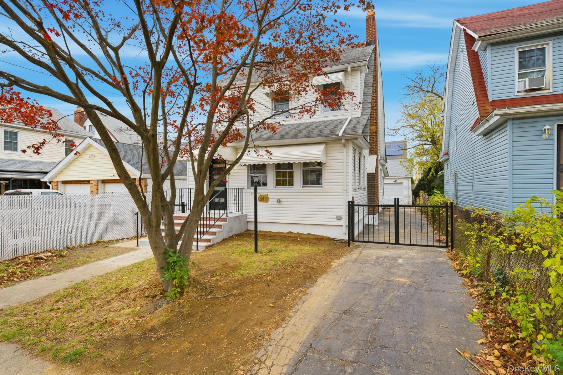 104-11 205th Street Queens, NY 11412 - Photo 3 of 50 View of front of home featuring a gate