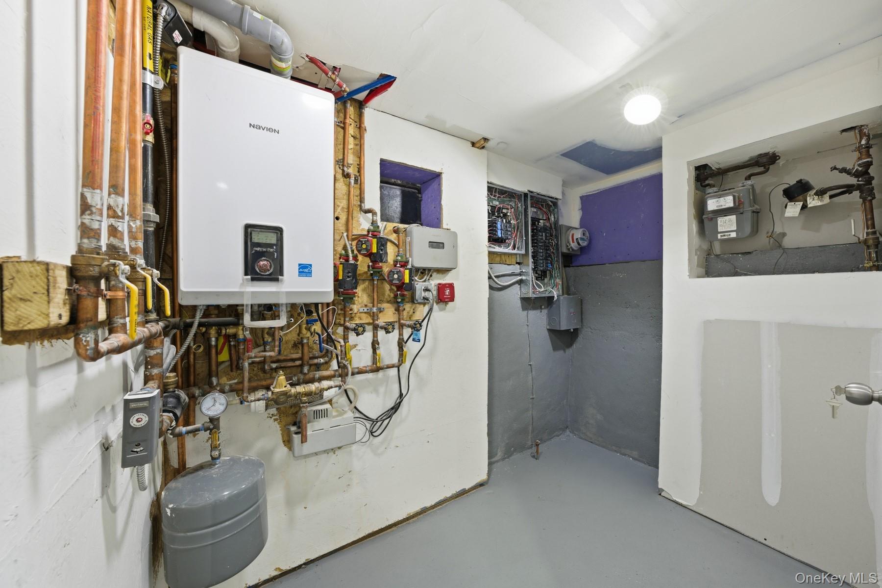 104-11 205th Street Queens, NY 11412 - Photo 40 of 50 Utility room with water heater