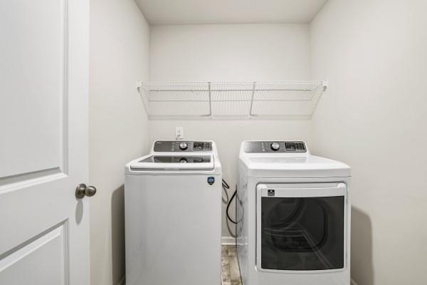 292 Whitetail Circle Canton, GA 30115 - Photo 13 of 17 a utility room with dryer and washer