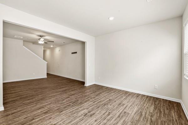 292 Whitetail Circle Canton, GA 30115 - Photo 4 of 17 a view of an empty room with wooden floor