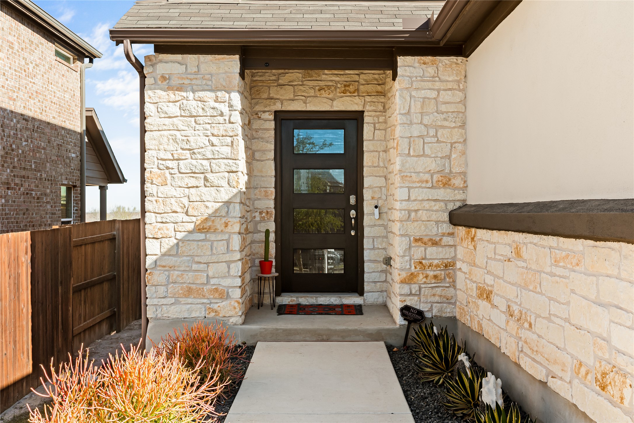 862 Pepperbark Loop Buda, TX 78610 - Photo 2 of 40 a front view of a house with a window