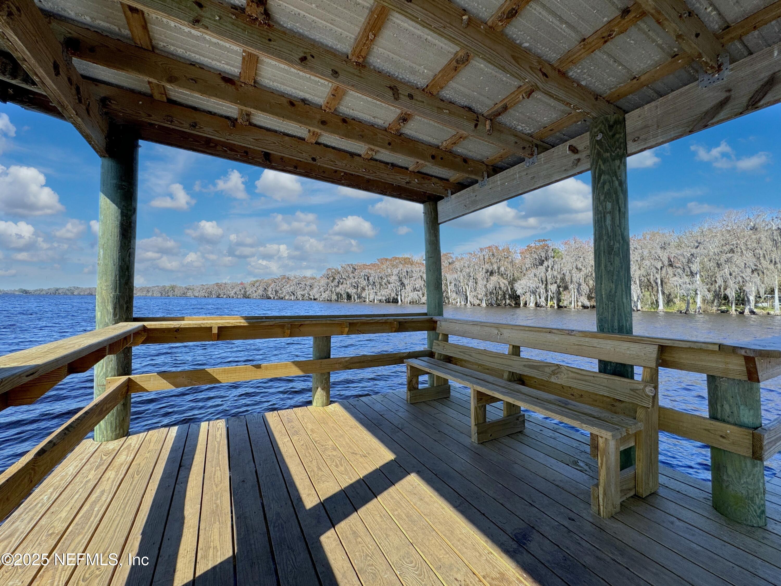 136 Helen Avenue Georgetown, FL 32139 - Photo 16 of 25 a sitting area with furniture on wooden floor