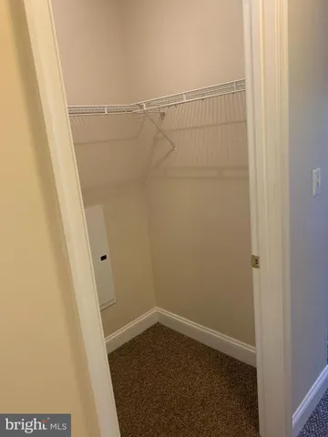 a view of a room with racks on the wall