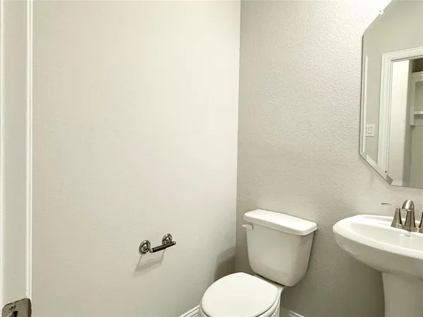 a view of a hallway with entryway