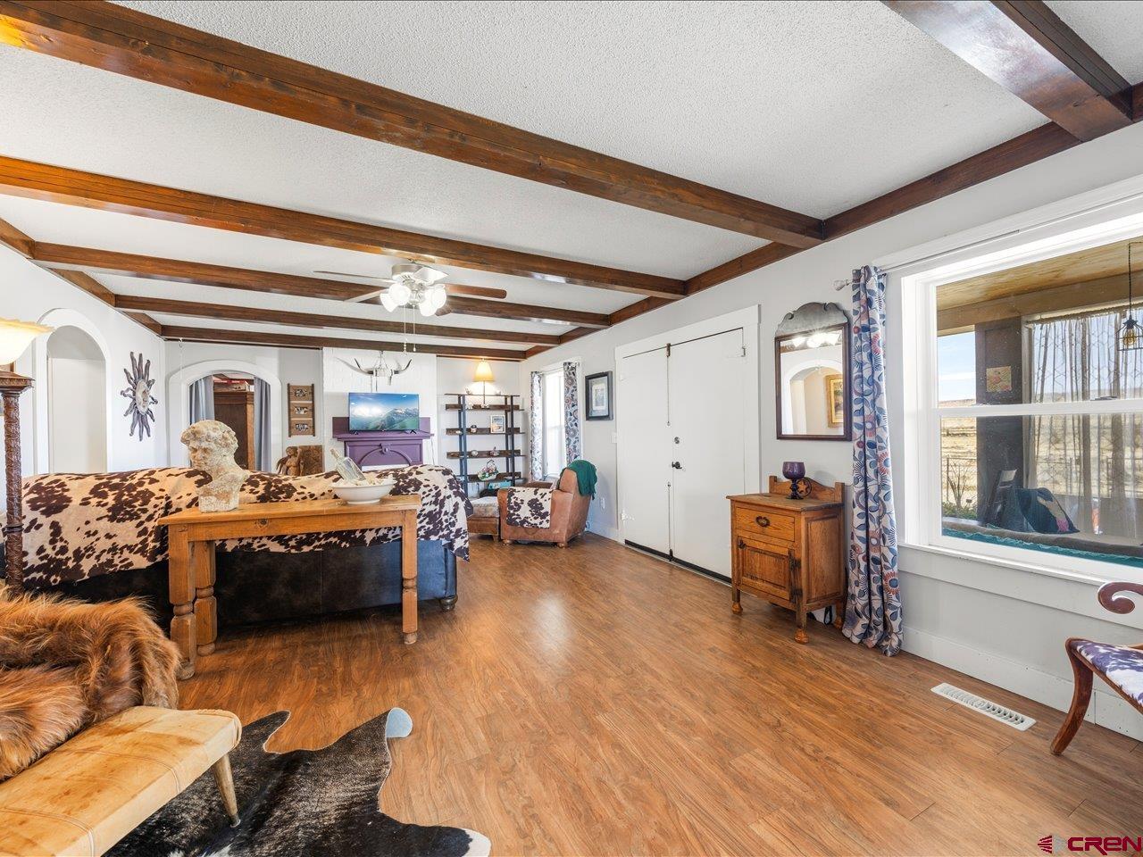 22244 F Road Delta, CO 81416 - Photo 8 of 41 a bed room with furniture and a window
