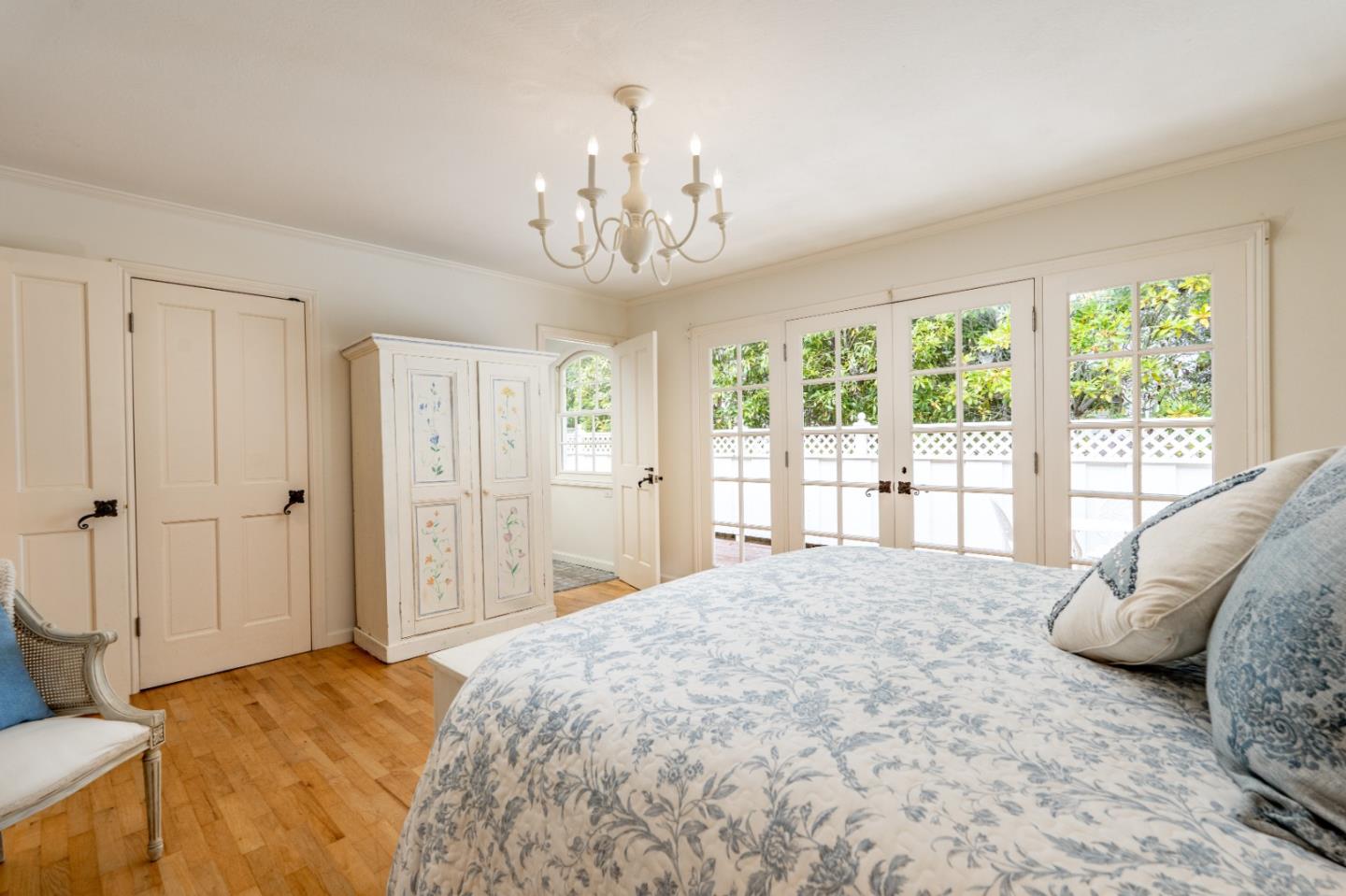 2952 Stevenson Drive Pebble Beach, CA 93953 - Photo 12 of 23 a spacious bedroom with a bed and a window