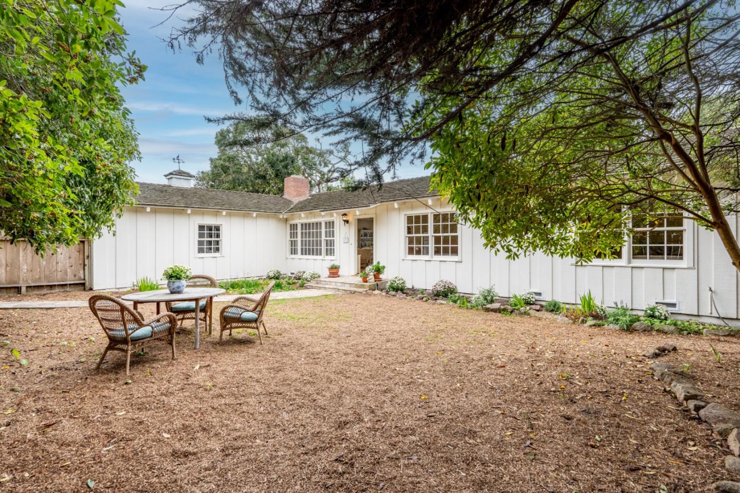 2952 Stevenson Drive Pebble Beach, CA 93953 - Photo 19 of 23 a view of a house with backyard and sitting area