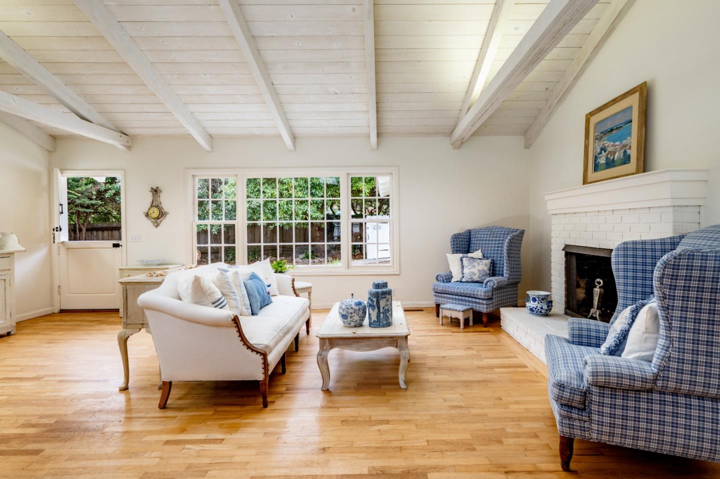 2952 Stevenson Drive Pebble Beach, CA 93953 - Photo 2 of 23 a living room with furniture and a fireplace