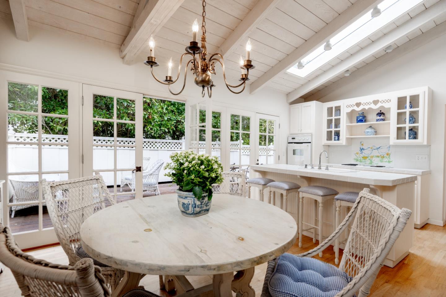 2952 Stevenson Drive Pebble Beach, CA 93953 - Photo 5 of 23 a view of a dining room with furniture a chandelier and large windows