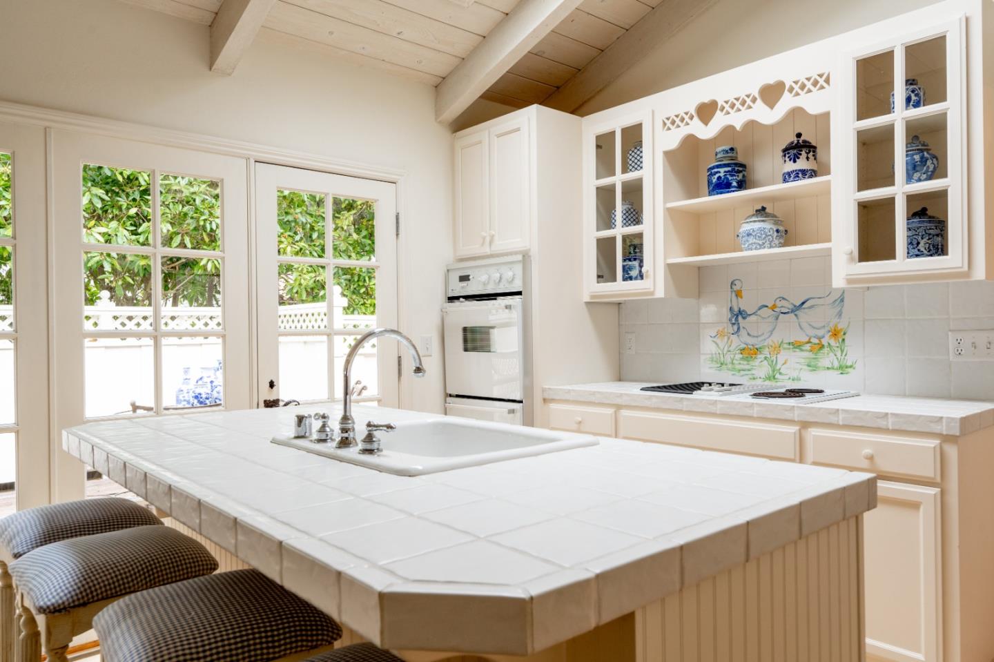2952 Stevenson Drive Pebble Beach, CA 93953 - Photo 7 of 23 a dining table with chairs and window
