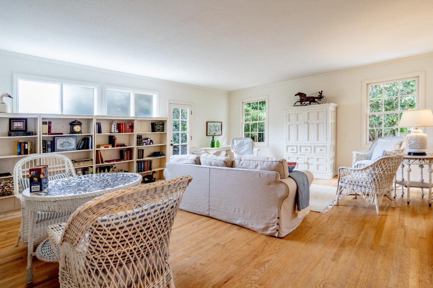 2952 Stevenson Drive Pebble Beach, CA 93953 - Photo 10 of 23 a living room with furniture and a wooden floor