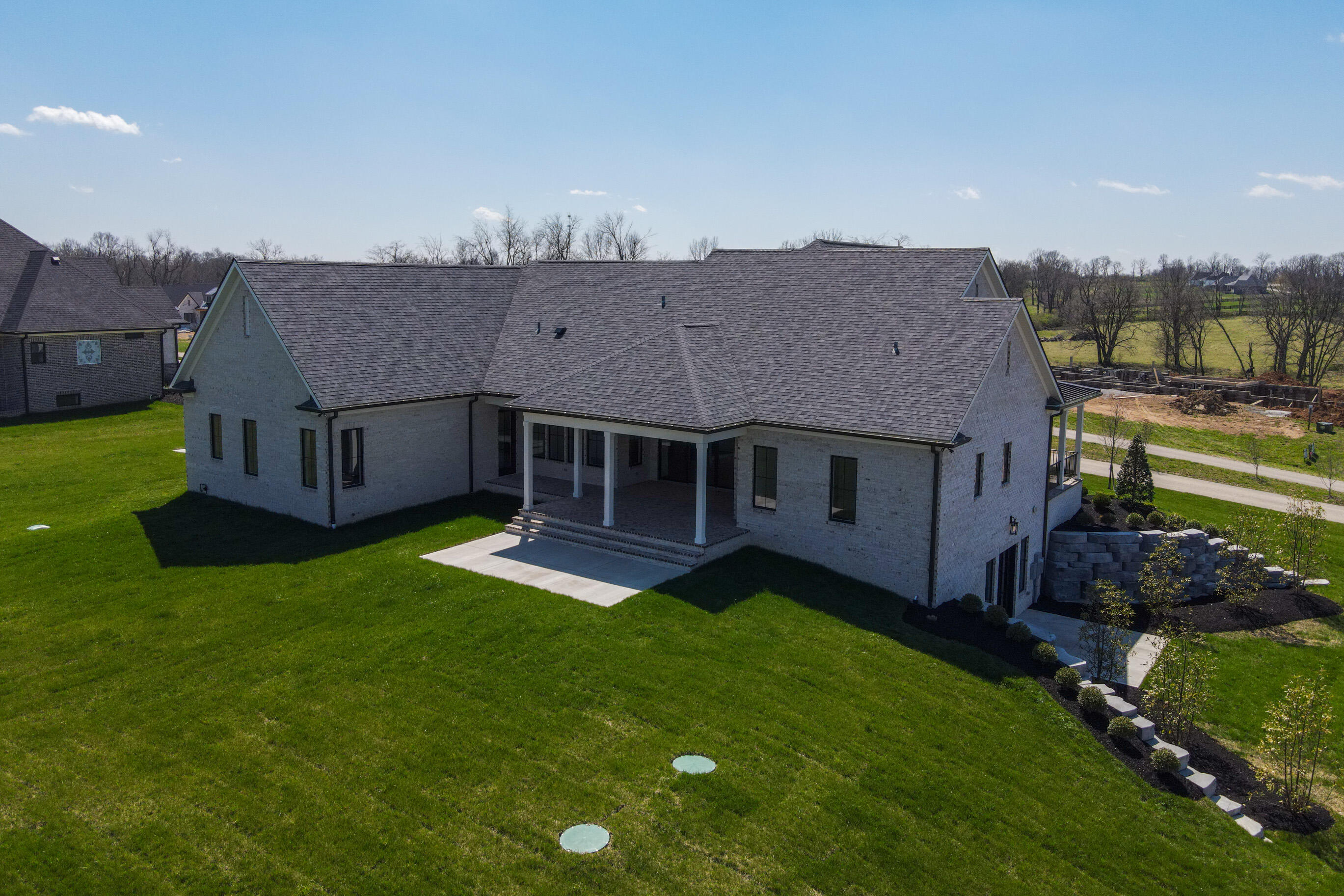 213 Doe Road Lexington, KY 40515 - Photo 6 of 67 20240328-213-Doe-Run-drone-tem-008_web