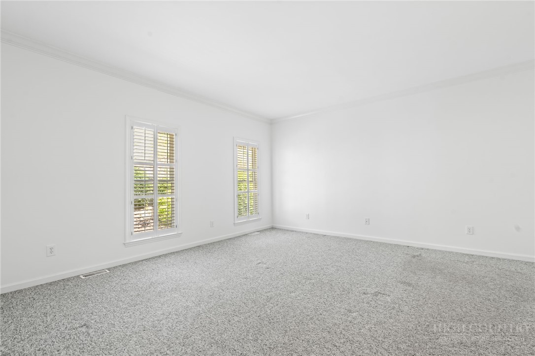 480 North Ridge Circle Boone, NC 28607 - Photo 16 of 50 an empty room with windows
