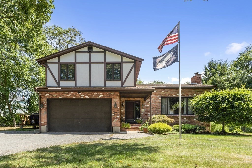 a front view of house with yard
