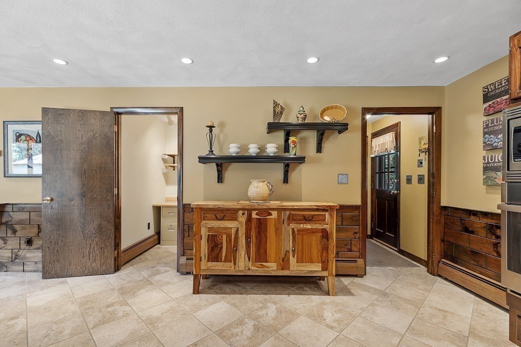 14 Shawmut Avenue Danvers, MA 01923 - Photo 16 of 40 a view of kitchen with stainless steel appliances granite countertop cabinets and window