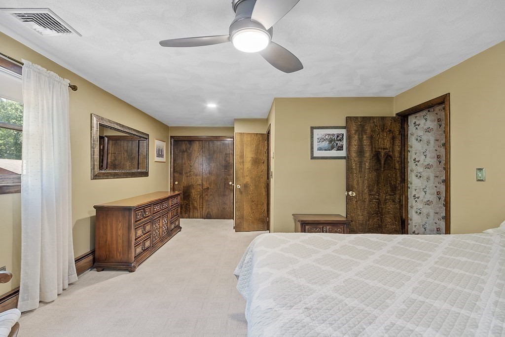 14 Shawmut Avenue Danvers, MA 01923 - Photo 24 of 40 a bedroom with a bed dresser and a window