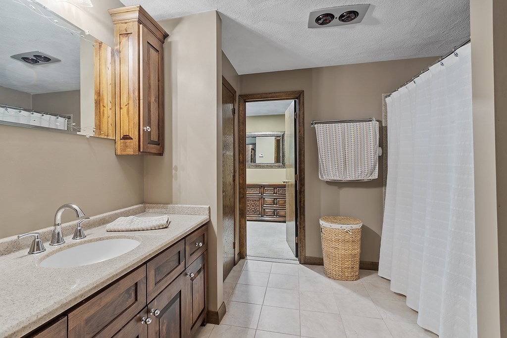 14 Shawmut Avenue Danvers, MA 01923 - Photo 25 of 40 a bathroom with a sink and mirror