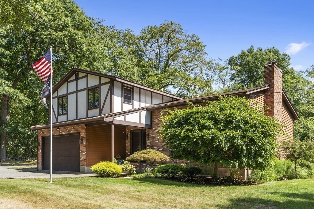 14 Shawmut Avenue Danvers, MA 01923 - Photo 3 of 40 a house with trees in front of it
