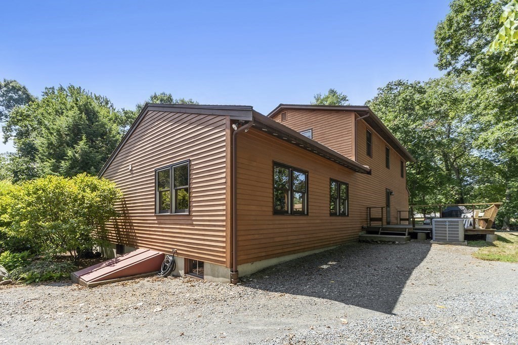 14 Shawmut Avenue Danvers, MA 01923 - Photo 33 of 40 a view of a house with a yard