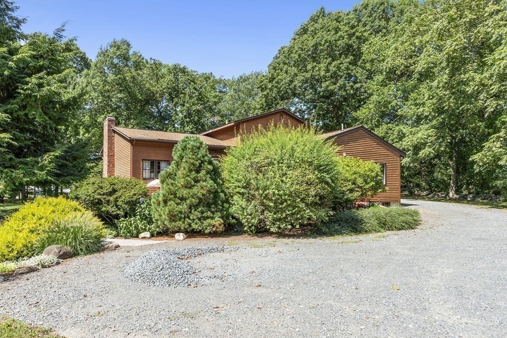 14 Shawmut Avenue Danvers, MA 01923 - Photo 34 of 40 a front view of a house with a yard