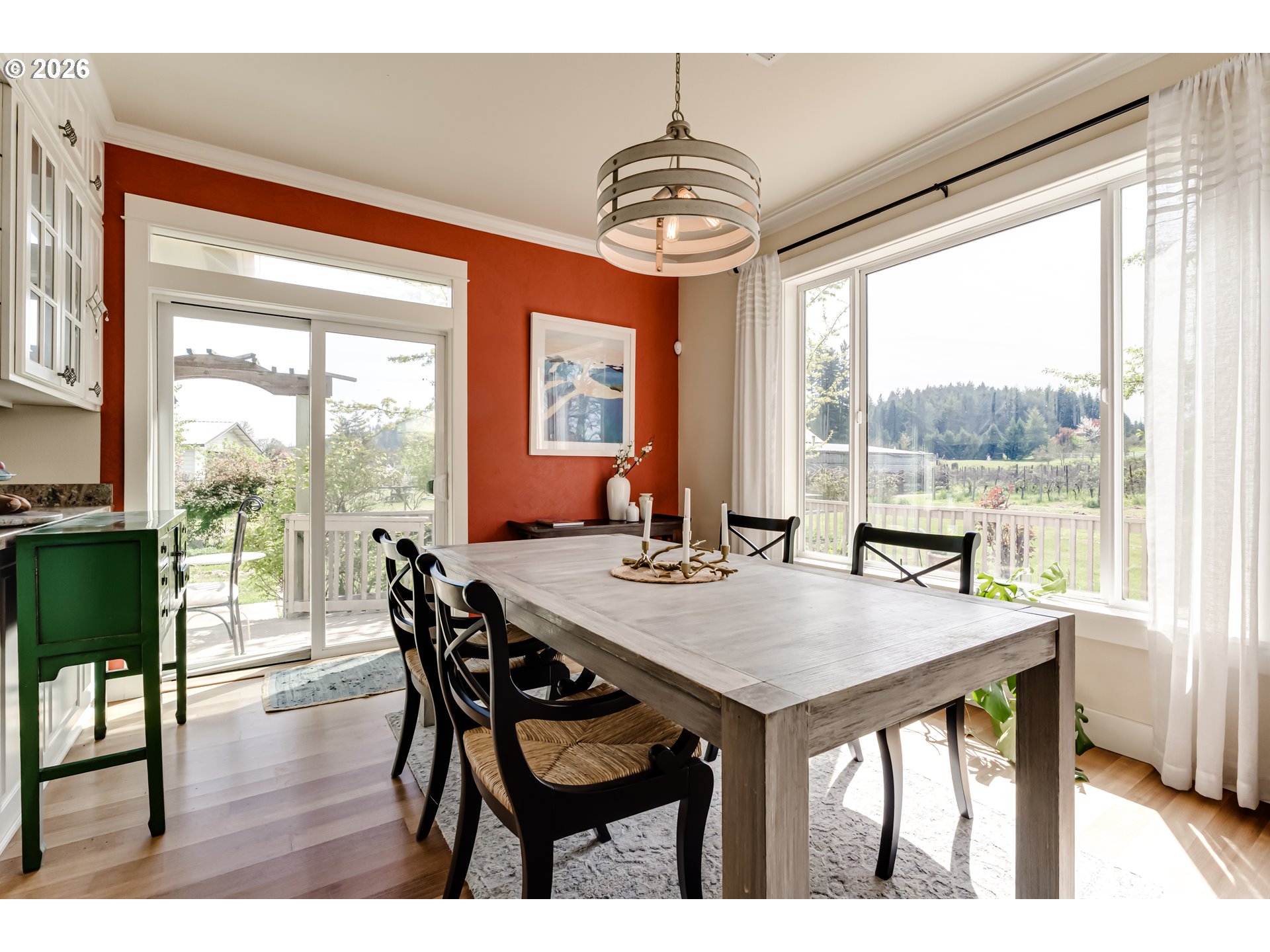 34386 Mathews Road Eugene, OR 97405 - Photo 34 of 48 a view of a dining room with furniture window and wooden floor