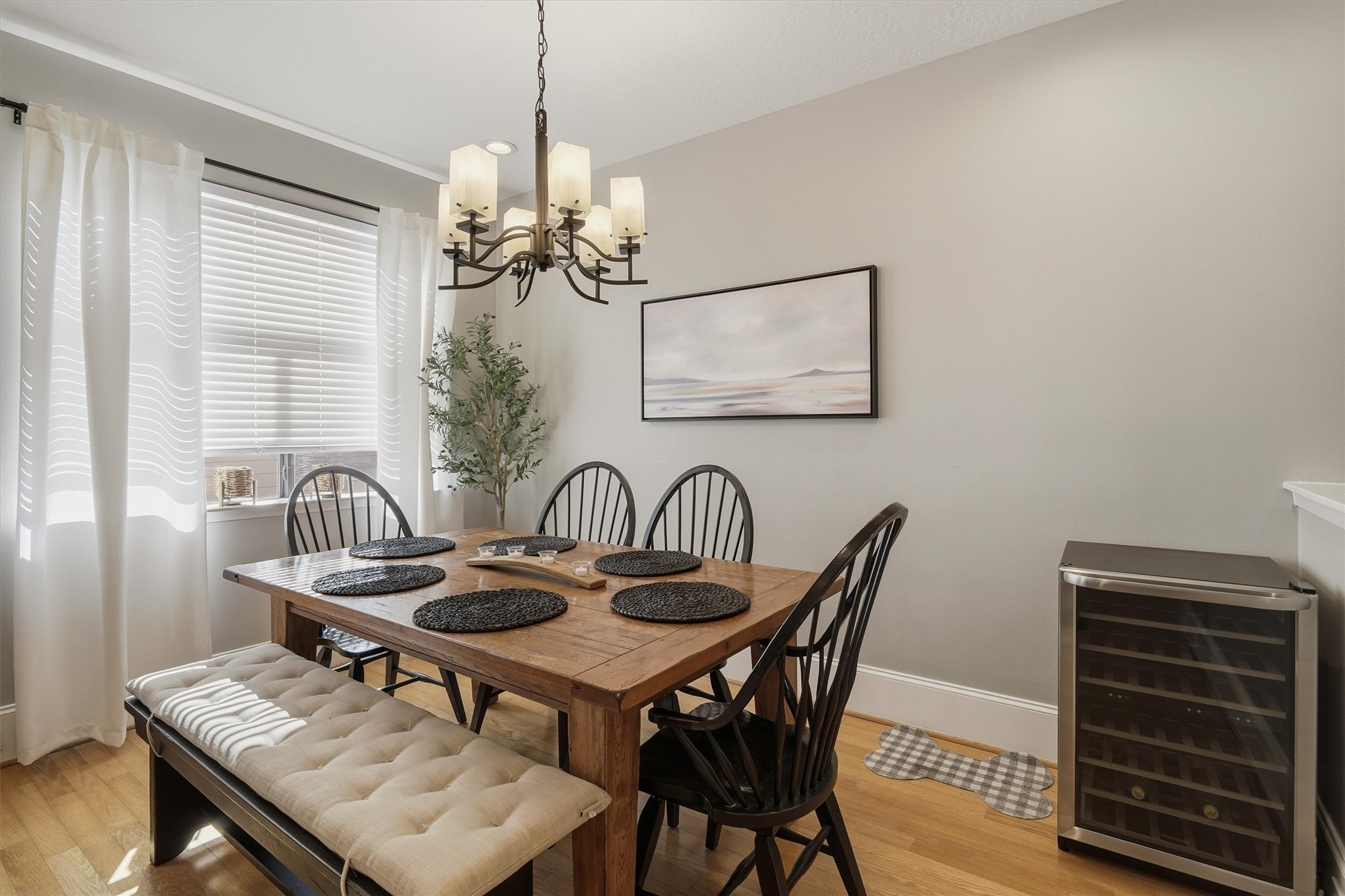 2529 Rusk Street Houston, TX 77003 - Photo 9 of 23 Dedicated dining area with chandelier and hardwood floors