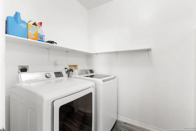 a utility room with dryer and washer