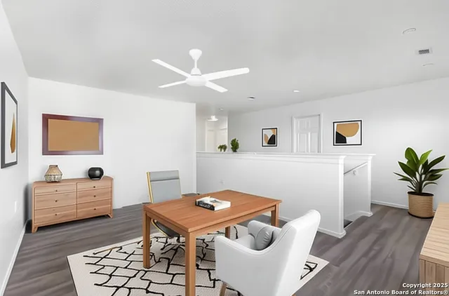 a room with furniture and wooden floor