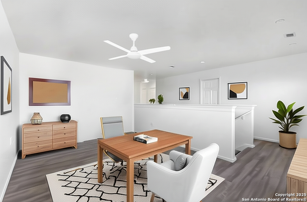 11101 Baywave Live Oak, TX 78233 - Photo 25 of 38 a room with furniture and wooden floor