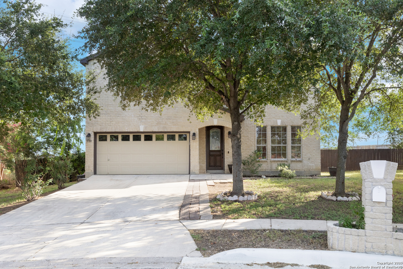 11101 Baywave Live Oak, TX 78233 - Photo 3 of 38 a front view of a house with garden