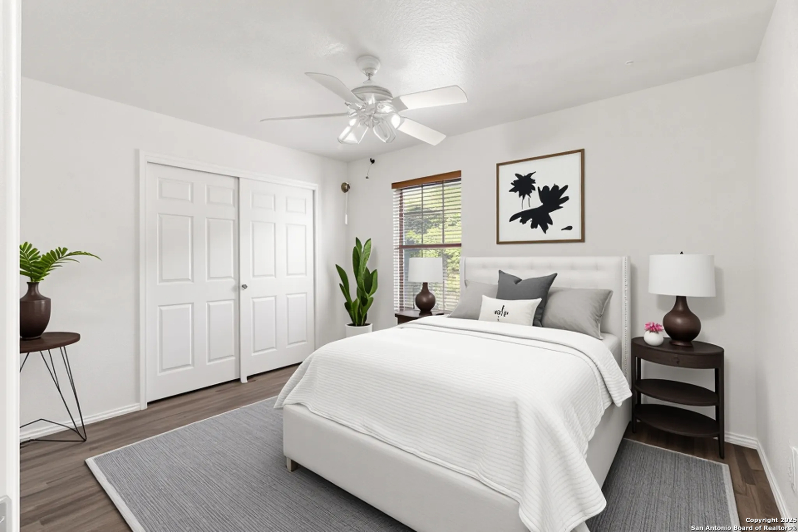 11101 Baywave Live Oak, TX 78233 - Photo 33 of 38 a bedroom with a bed and a chandelier