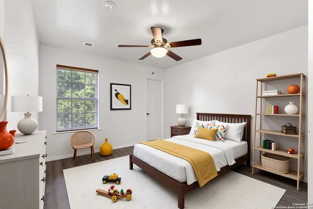 a bedroom with bed and window