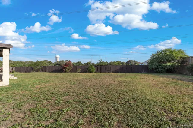 a view of an ocean and a yard