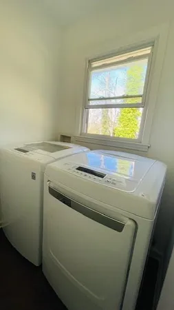 a bathroom with a sink and a window