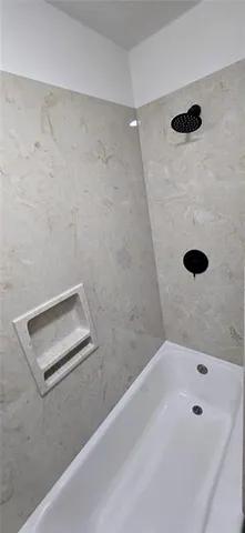 a bathroom with a tub